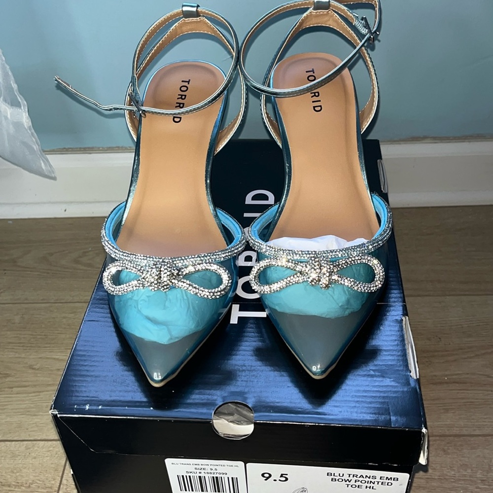 Blue transparent heels. New only tried them on once. Brand: Torrid, size: 9.5WW